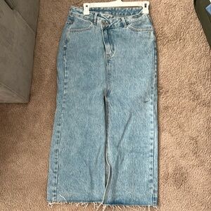 Long denim skirt with front slip